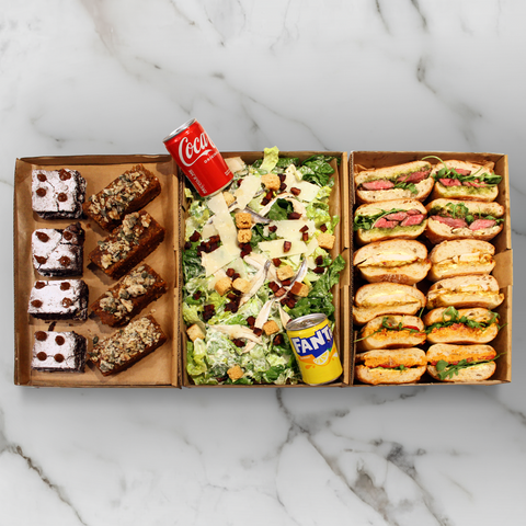 Mixed Sandwiches, Caesar Salad, Brownies and Drinks.