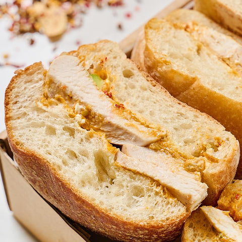 Pan Seared Chicken and Harissa Avocado Sandwich Platter