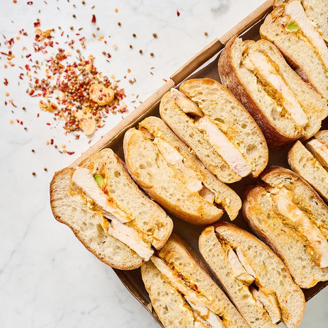 Pan Seared Chicken and Harissa Avocado Sandwich Platter